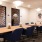 Meeting room with desks and chairs